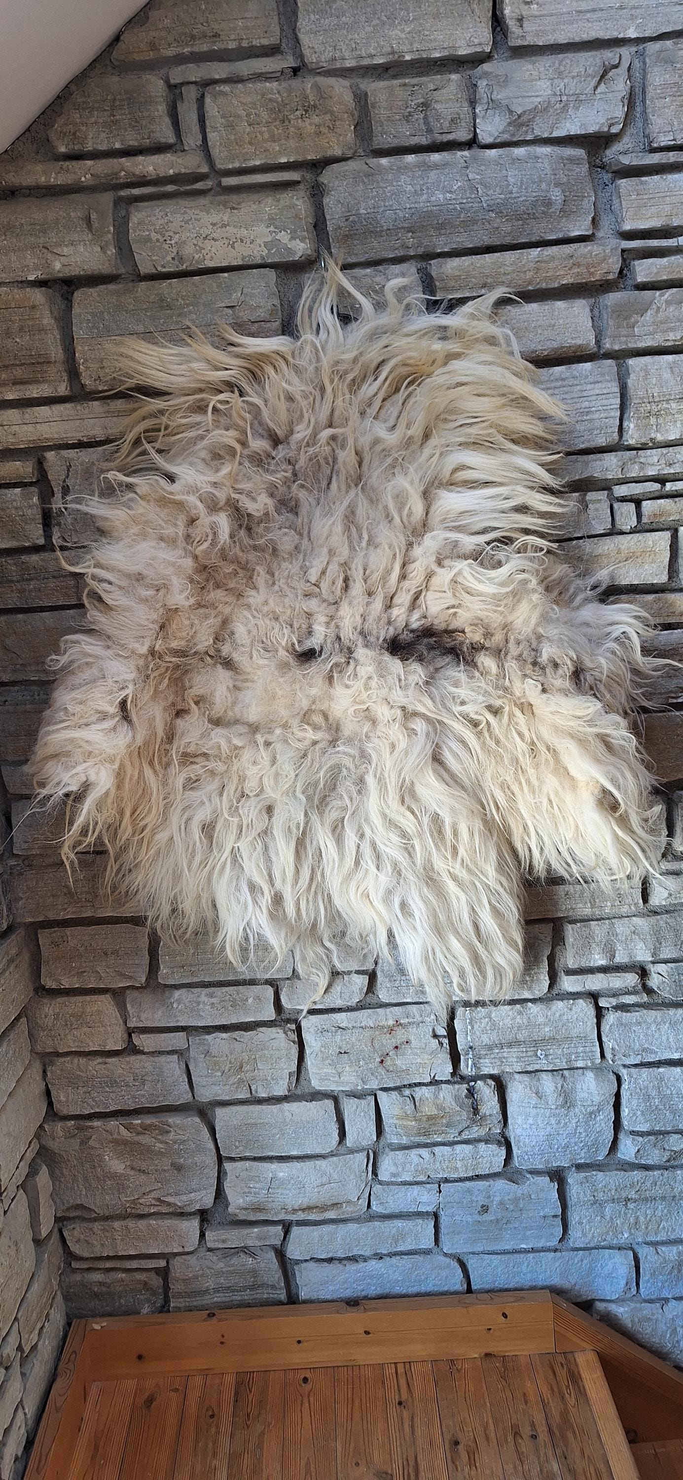 Felted rug. A rug made out a beautiful soft fleece ideal for adding warmt and texture to a sitting area or bed.