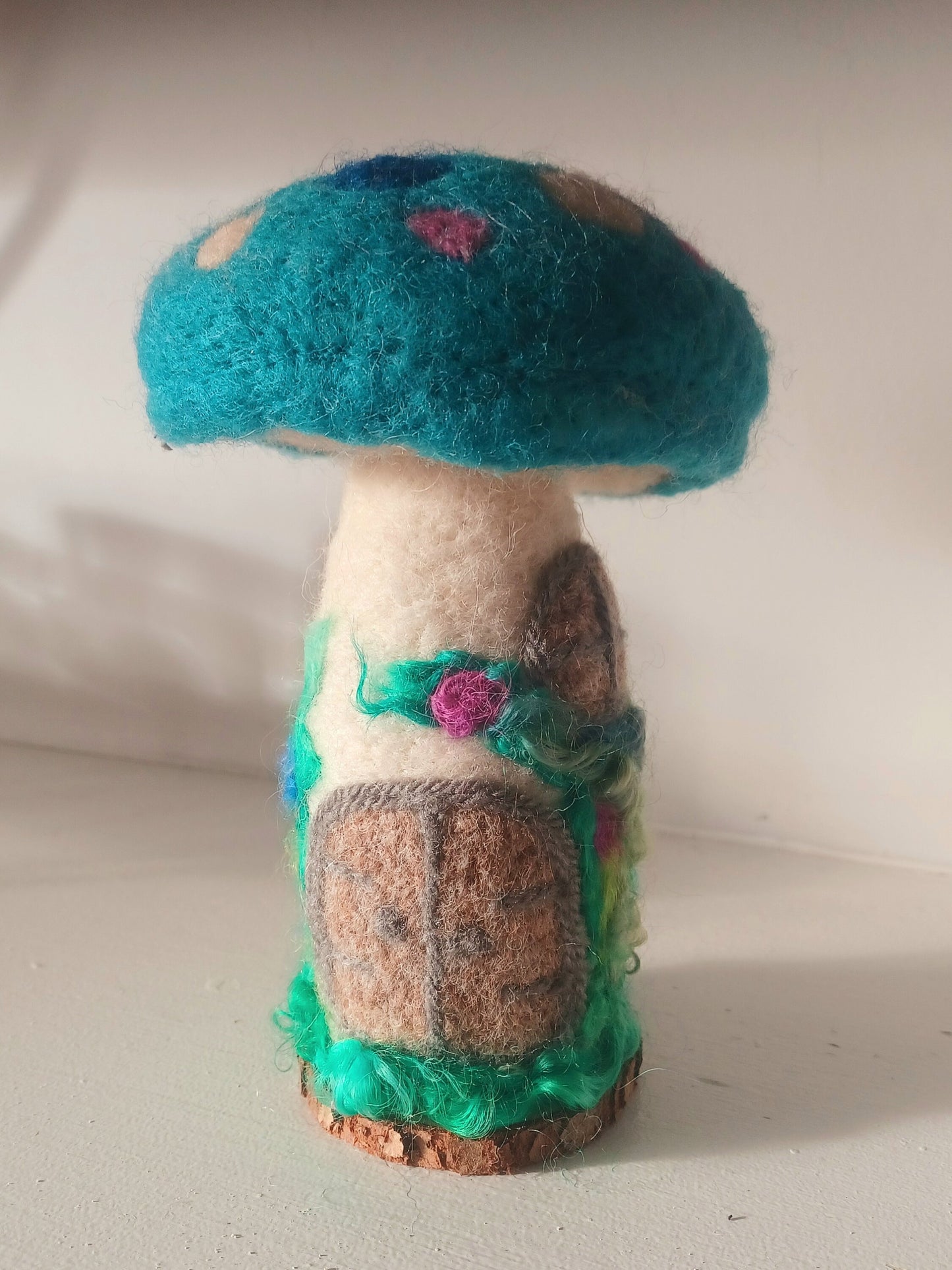 Beautiful felted mushroom ornament.