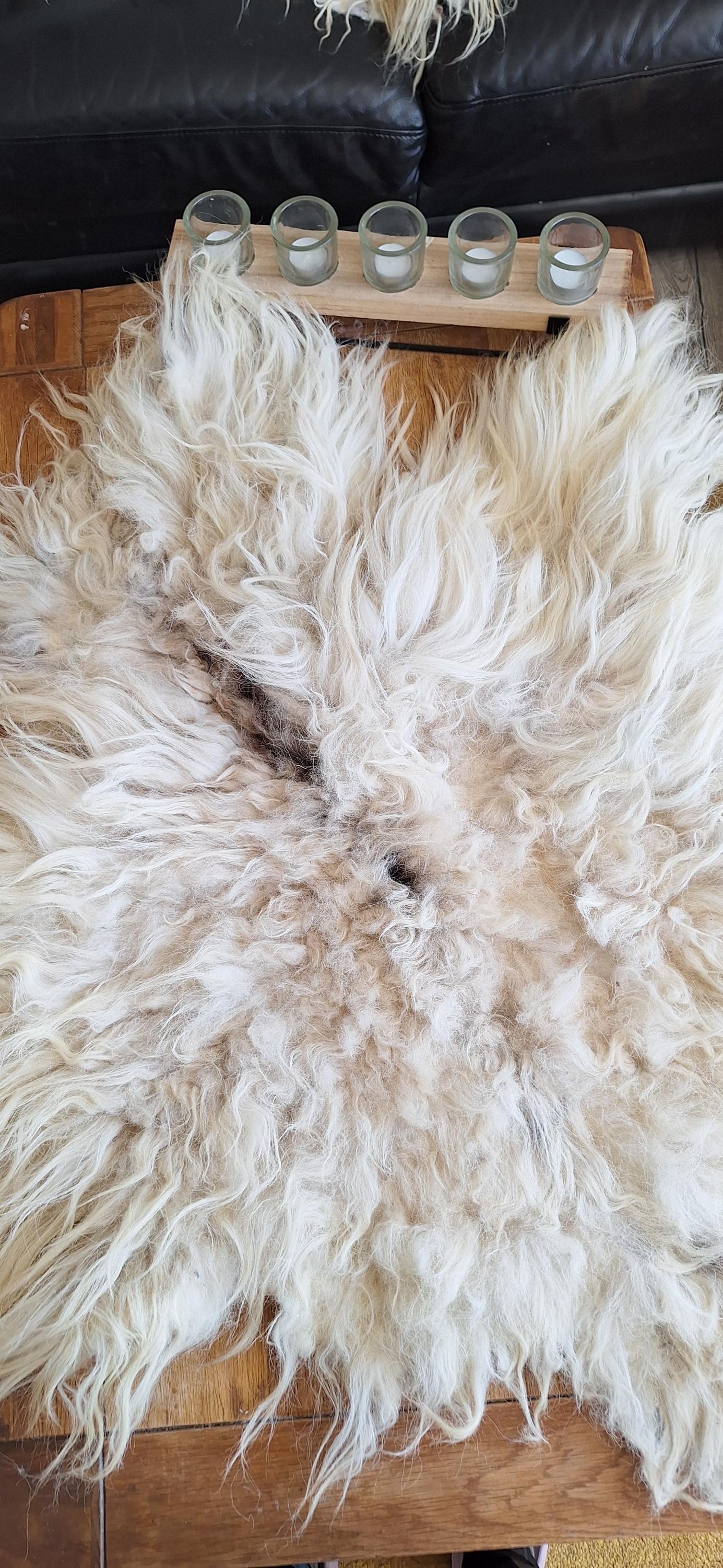Felted rug. A rug made out a beautiful soft fleece ideal for adding warmt and texture to a sitting area or bed.