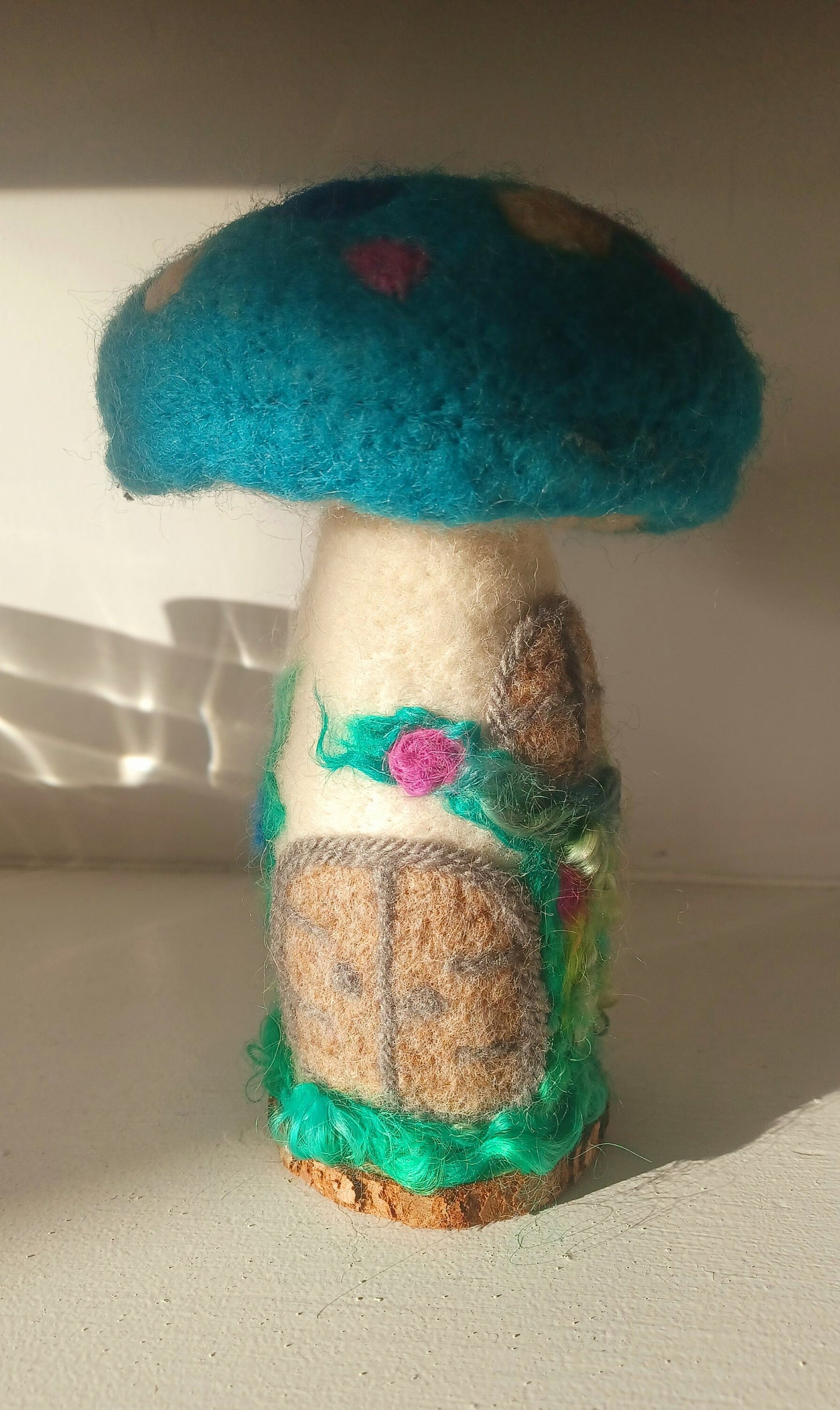 Beautiful felted mushroom ornament.