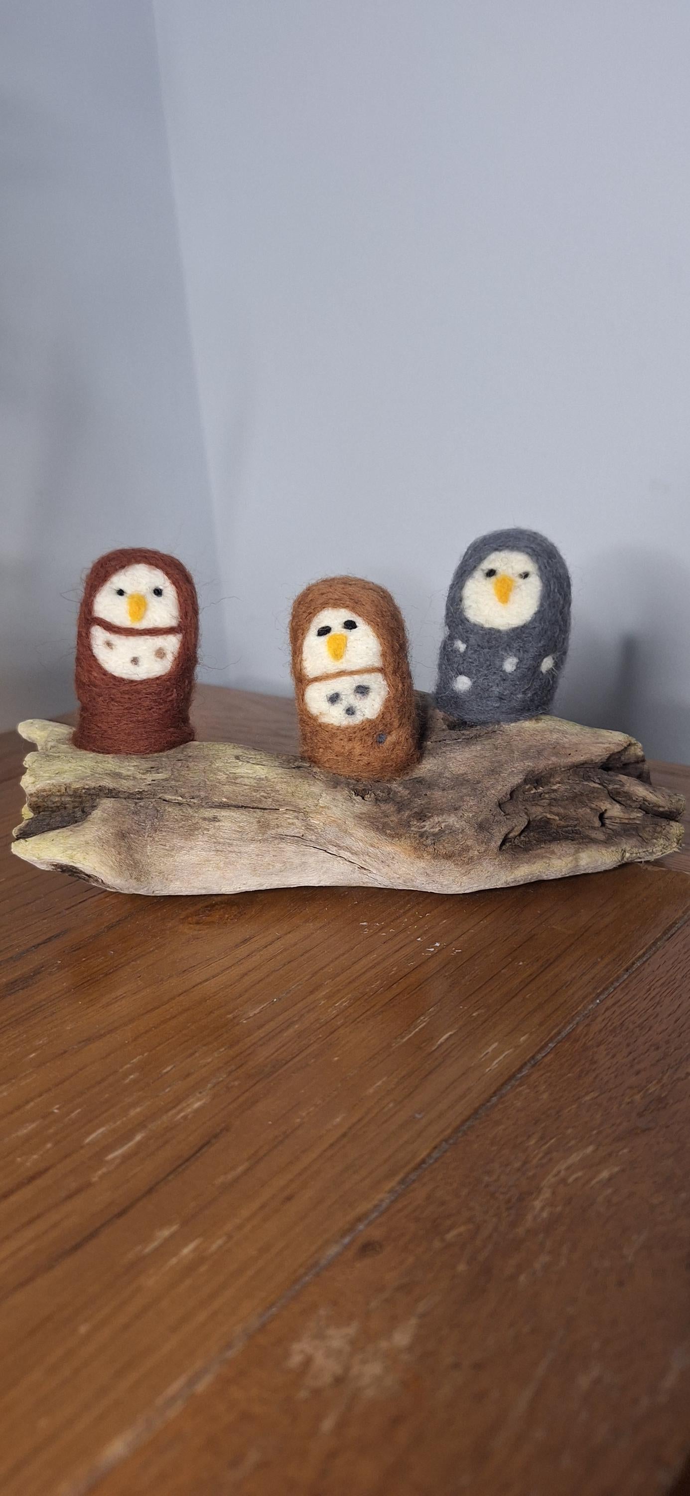 owls on driftwood.