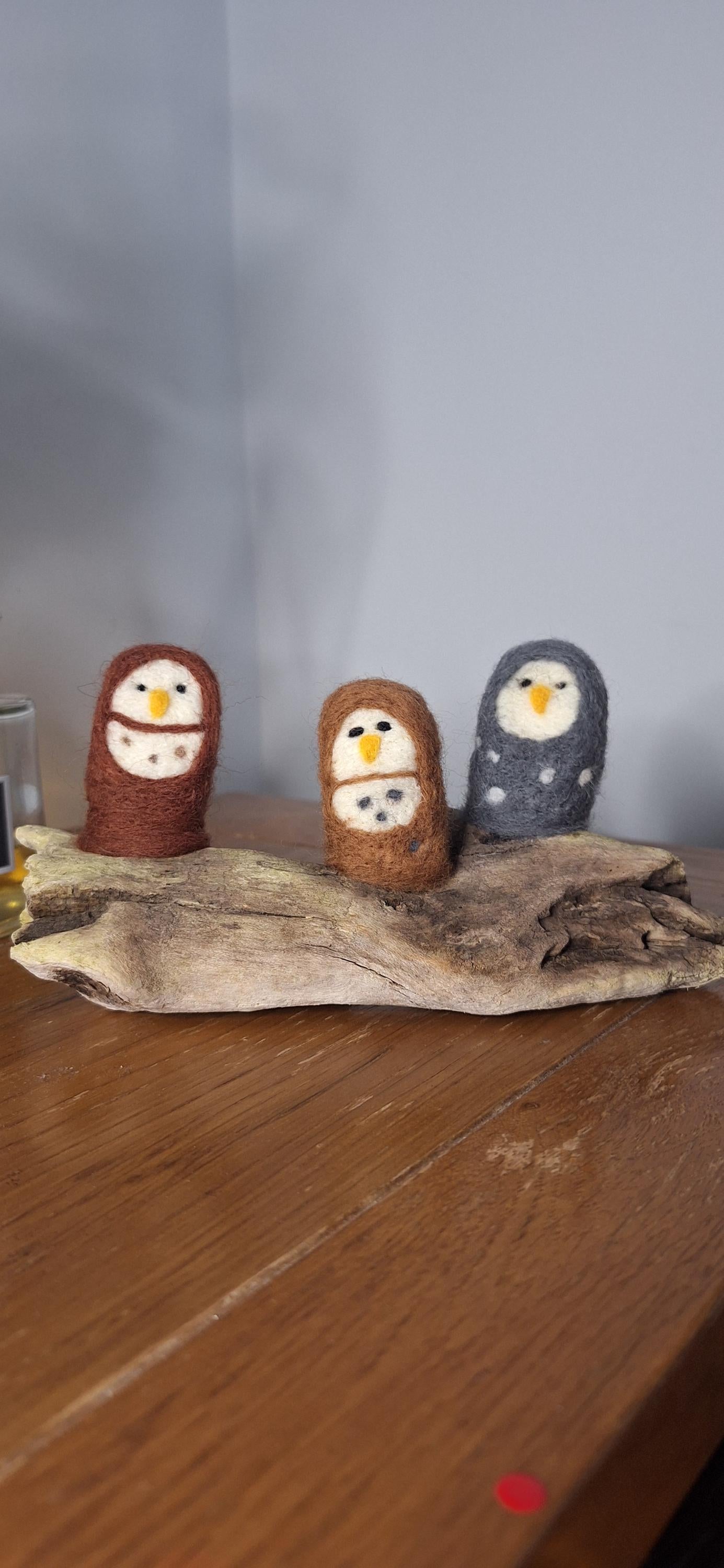 owls on driftwood.
