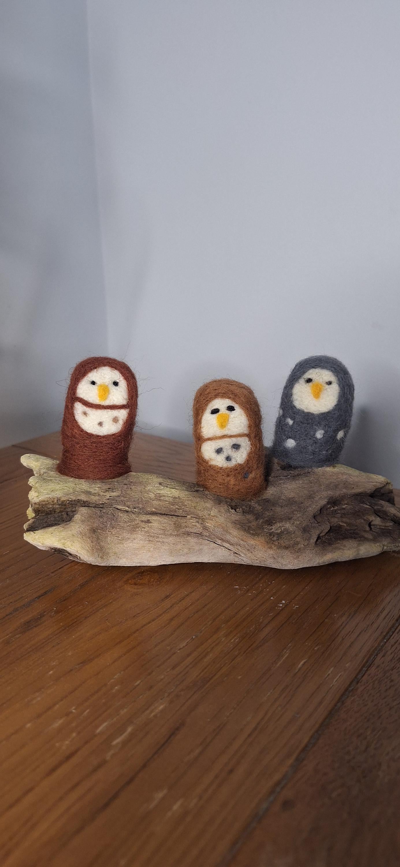 owls on driftwood.