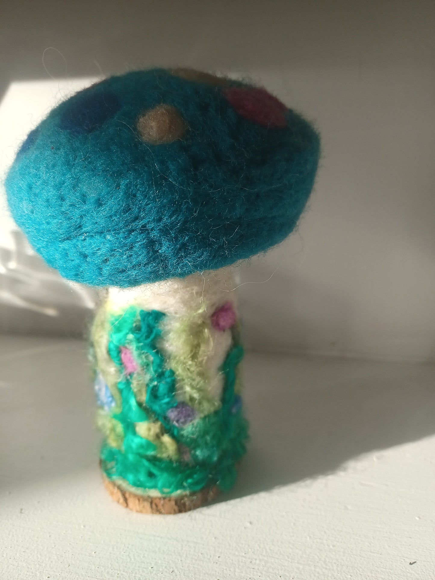 Beautiful felted mushroom ornament.